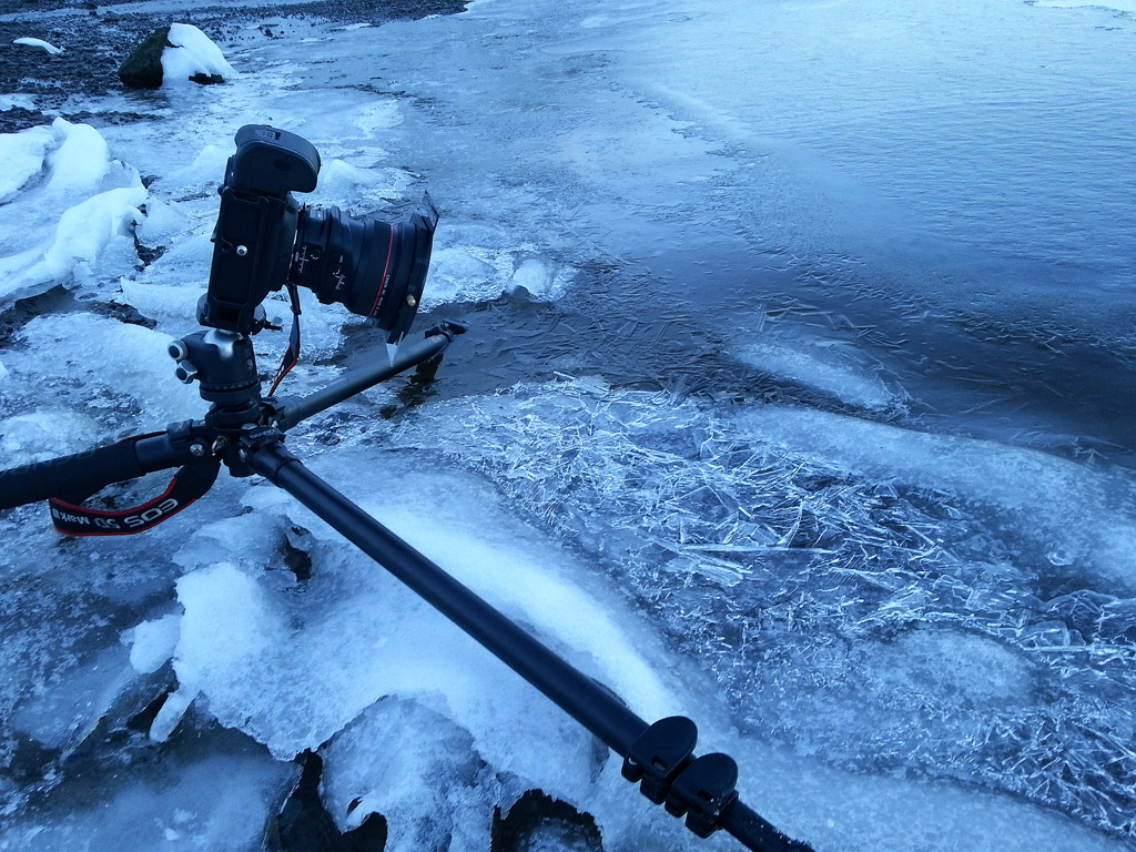 Placing one of the tripod's legs in the water - problem solved!