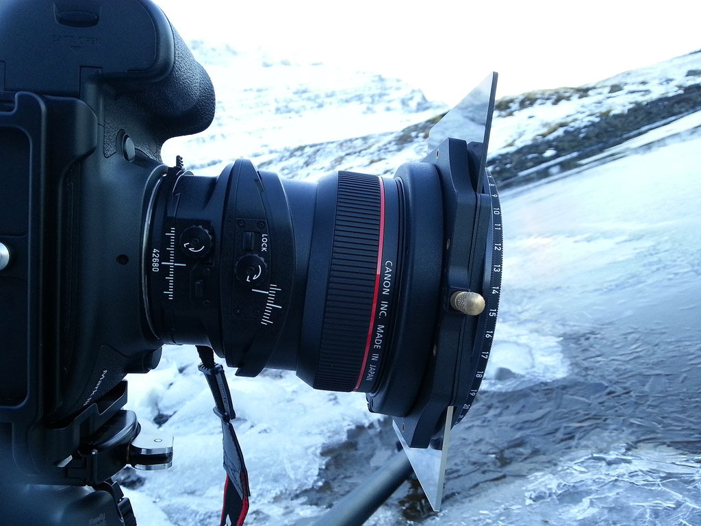 The custom-built adapter is made from the original 17mm TS-E lens-cap, taken apart and fitted with a Lee-system ring. Now I can use my Lee holder and filters on the lens despite its bulbus front element.The 3.5 degree tilt is also visible on the scale. 