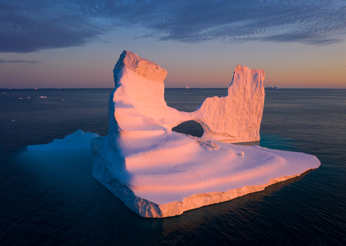 It's hard to resist the allure of flying a drone between the ice giants of Disko Bay. Be be wary of GPS malfunctions - they can cost you your drone. </br>DJI Mavic II Pro, 1/30 sec, f/8, ISO 100. Disko Bay, Greenland