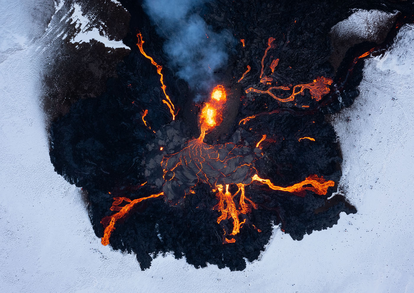 The 2021 Fargradalsfjall eruption in Iceland was a wonderful opportunity to get original compositions. The volcano sprouted new fissures by the day, and together with ever-changing weather conditions, it felt like a different location with each visit. <br>DJI Mavic II Pro, f/7.1, 1/30 sec, ISO 100 <br>Fargradalsfjall, Iceland