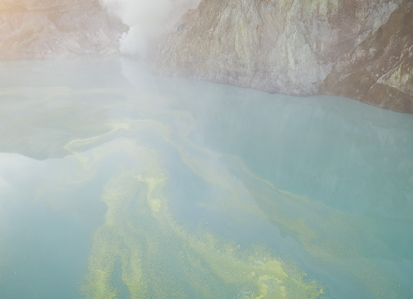 I had some fun trying abstract photography with the drone, as I flew it close to the crater lake. Especially nice was flying the drone through the sulfuric gasses, which create an eerie haze.