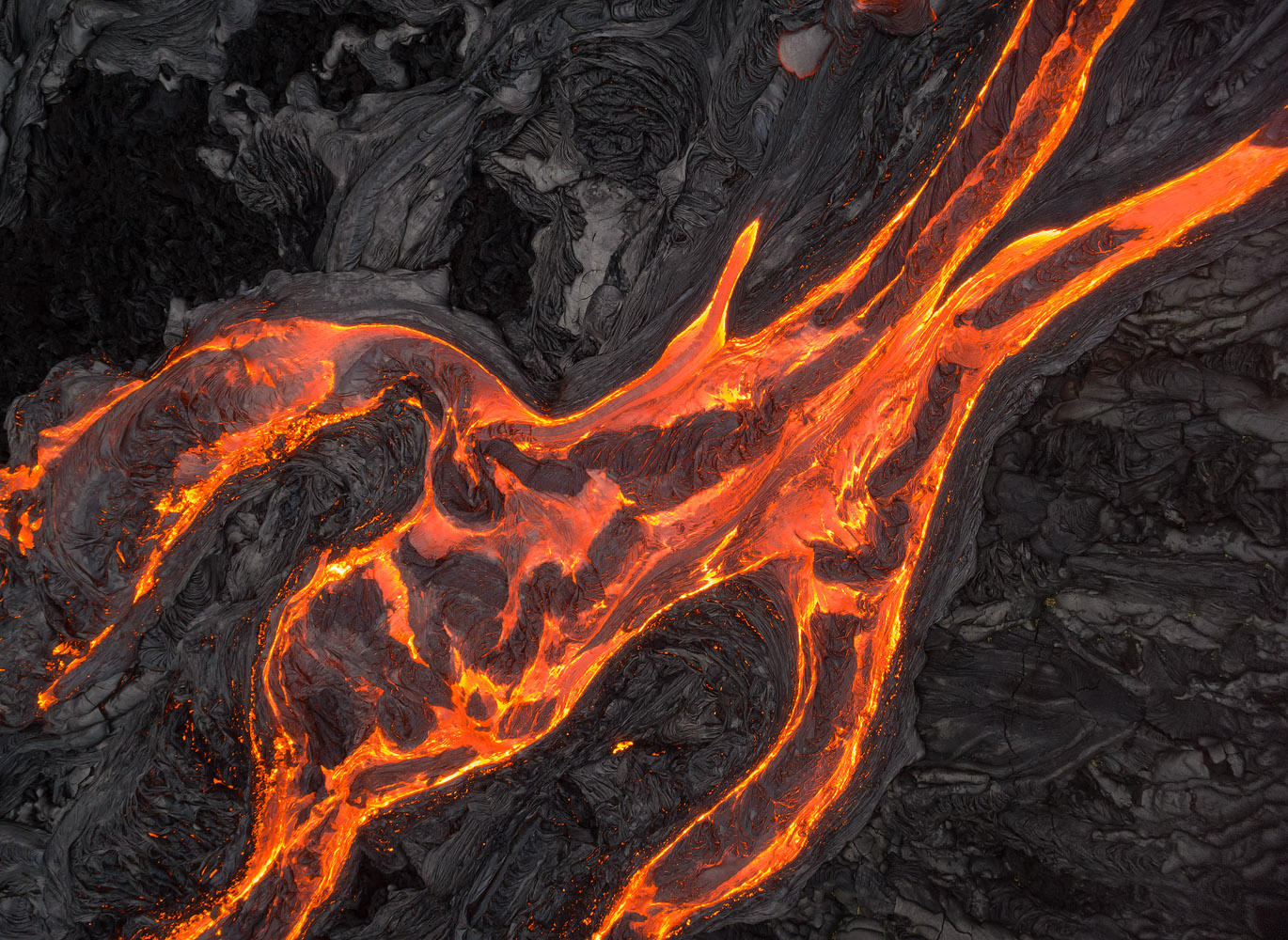 Lava surface-flows in Kilauea Volcano, Hawaii. A top-down perspective resulted in a deliberate lack of depth, which in turn allowed me to concentrate the viewer on the shape of the flows. 