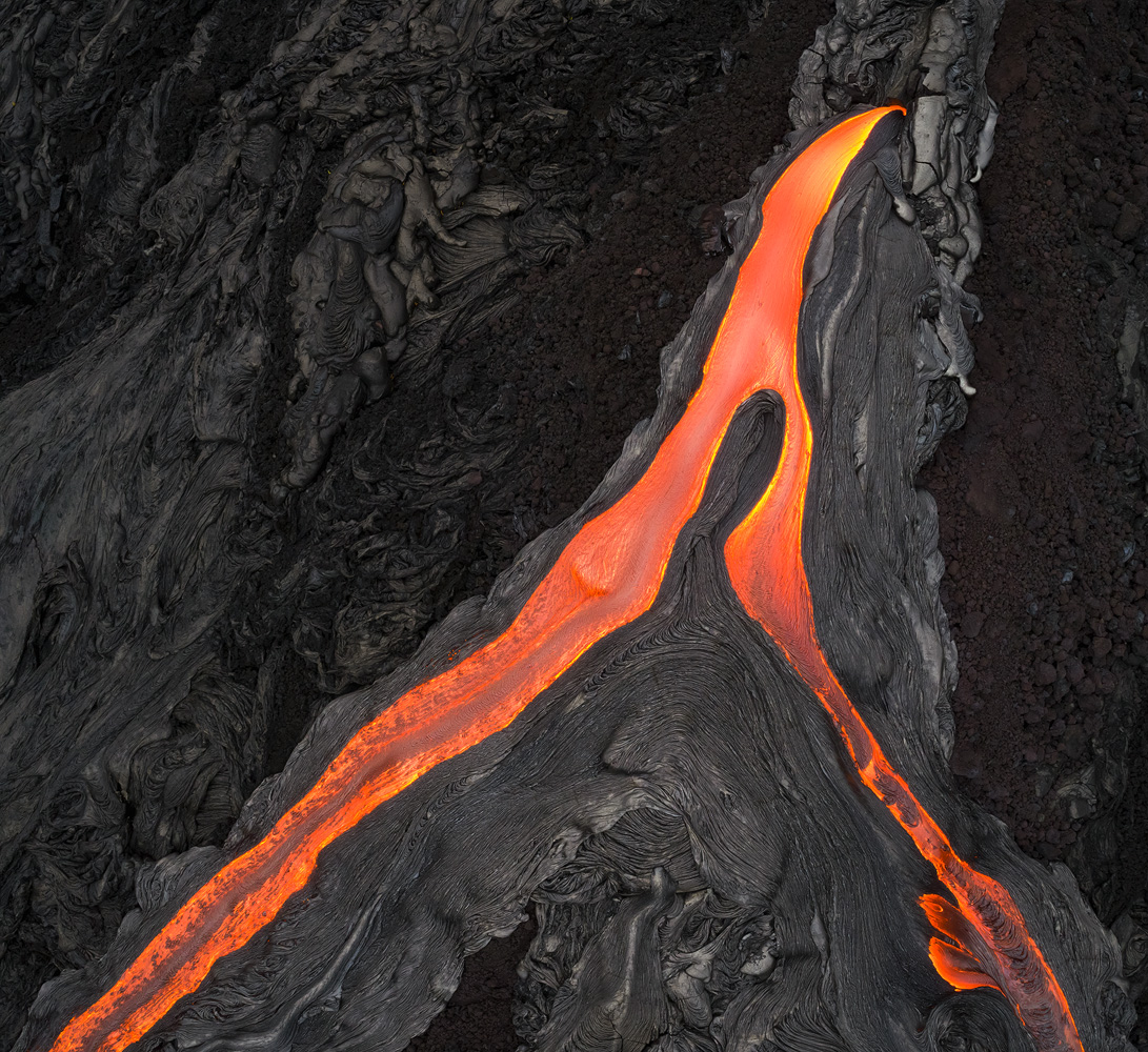 The point where the lava burst out of the mountain side was extremely hot. </br>DJI Phantom 4 Pro, 1/100 sec, f/6.3, ISO 400. Taken outside of Volcanoes NP, Island of Hawaii.