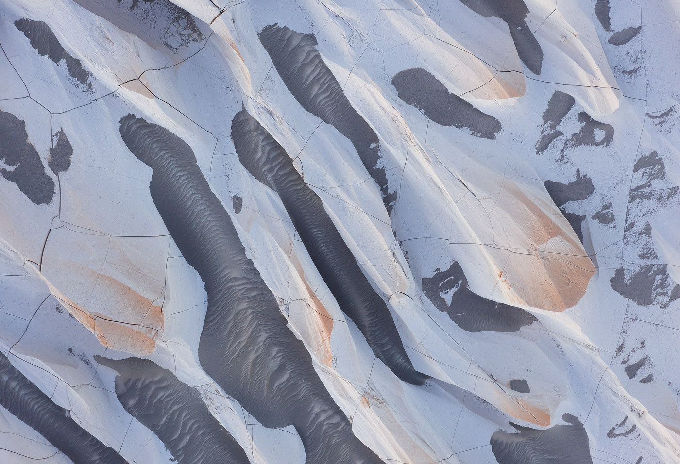 It's easy to be caught up shooting this beautiful Pumice-stone field, but the place is huge and the photographer must account for the drone's distance and sudden increases in wind forces, or they're risking the battery emptying before being able to bring the drone back to the launch point. </br>DJI Mavic II Pro, 1/25 sec, f/5.6, ISO 100. Puna de Argentina