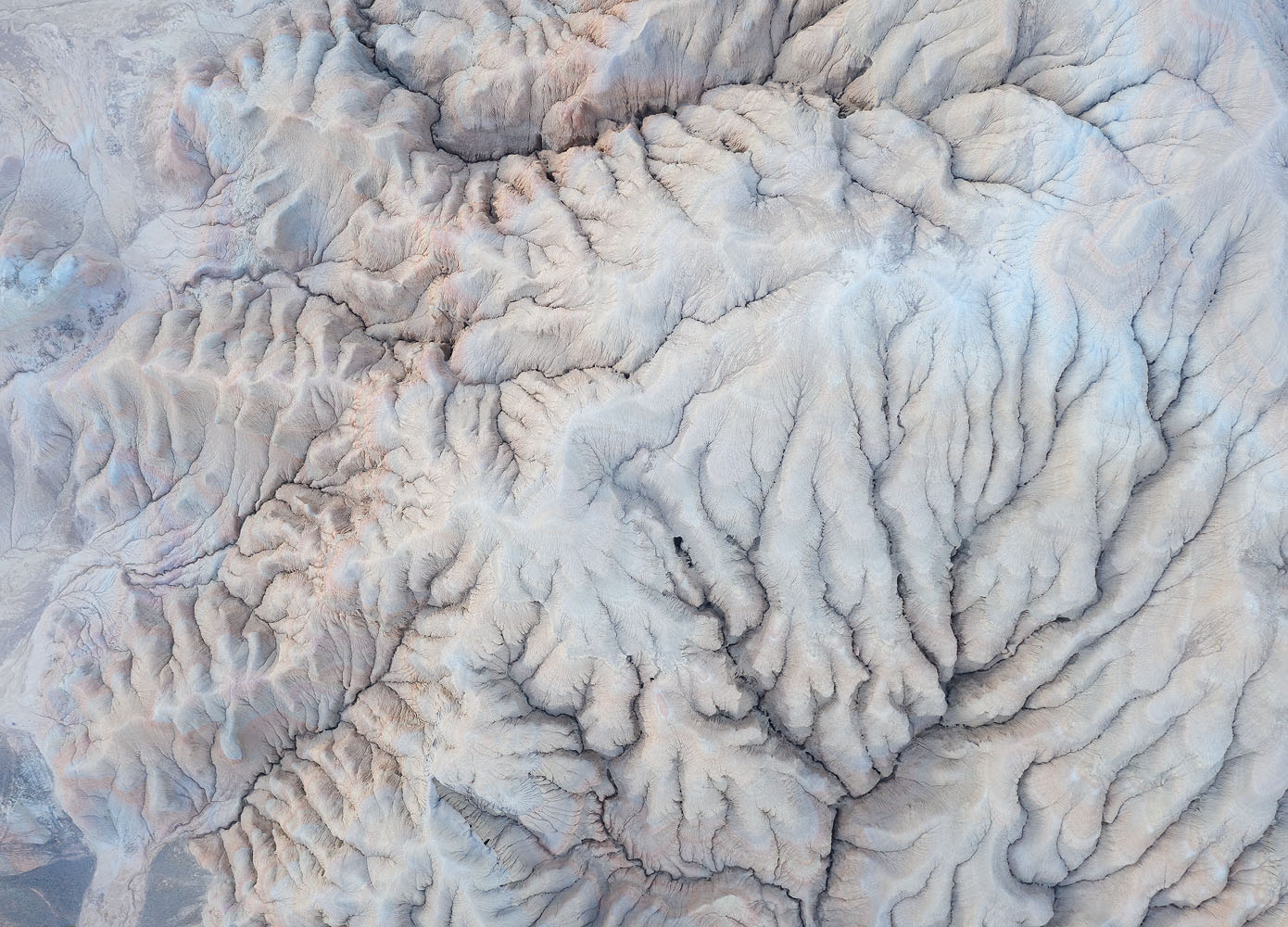 The badlands near the lake in daylight.