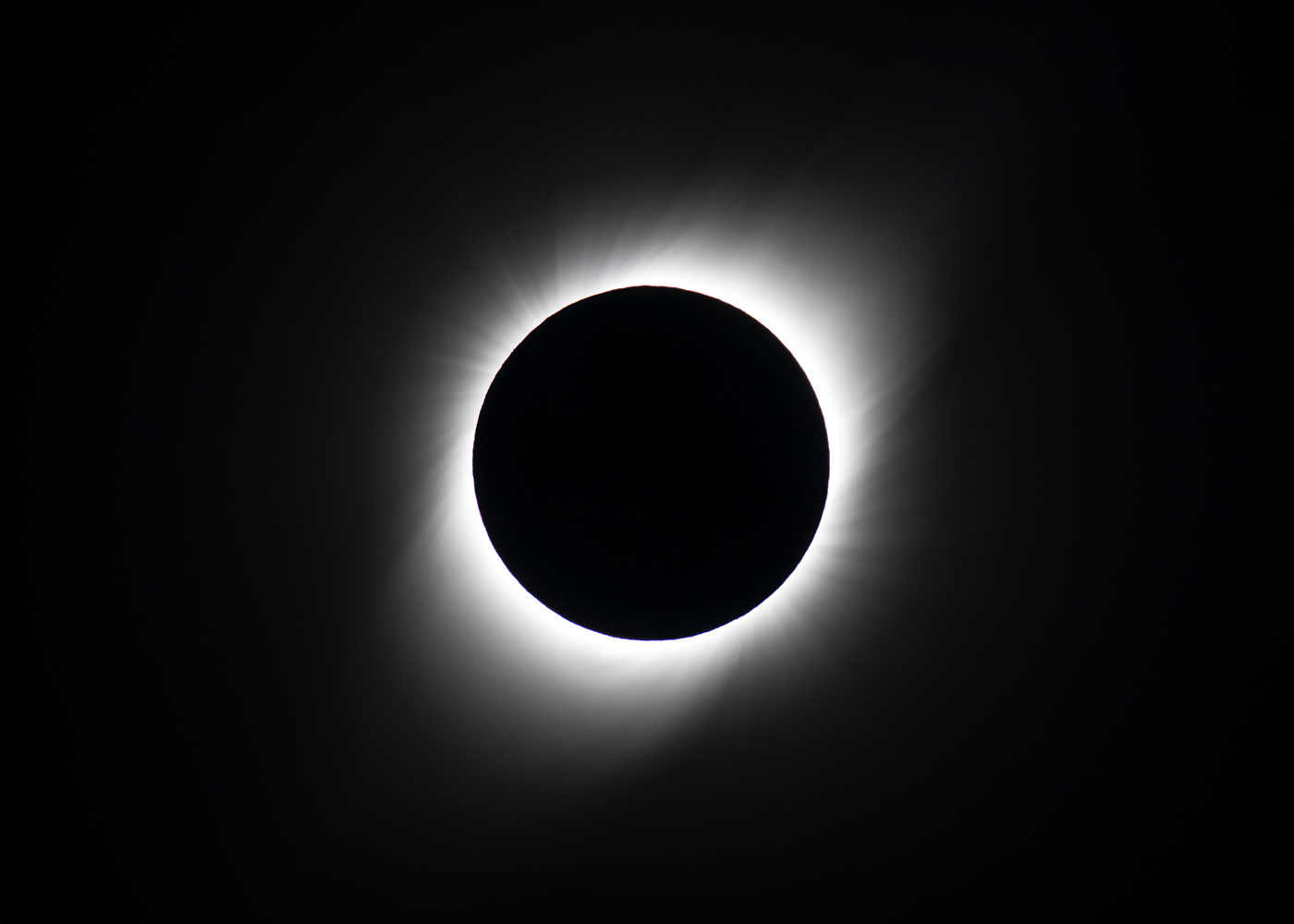 A closeup of the eclipse. These are actual colors, not a BW rendering. If you look closely, you'll be able to see the red fringe surrounding the sun. I especially liked the coronal rays and the beautiful symmetry. The fact that the protrusions in the corona were diagonal didn't hurt one bit. Canon 80D, Sigma 150-600mm at 600mm, f/8, 1/40 sec, ISO 200