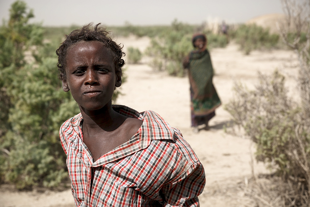 A young Afar tribesman. Life is incredibly hard in the Danakil Depression, and the Afar are a hardy folk, farming, mining salt and herding goats for a living. Their appealing appearance and feisty temper, together with the environment they live in, make them unique photographic subjects.  Canon 5D Mark III, Tamron 24-70mm F2.8 VC