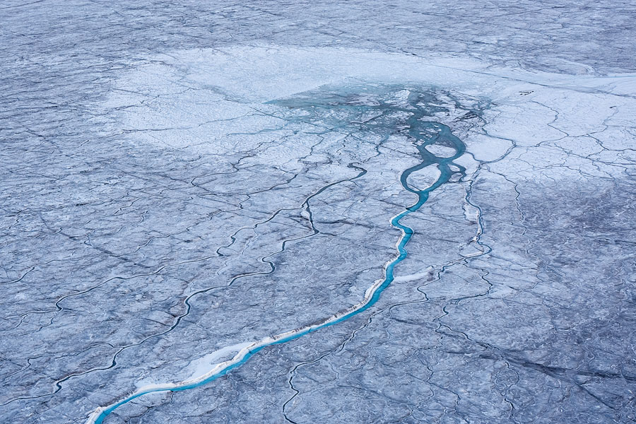 A glacial river in Greenland. Getting your settings right is important when shooting from the air. Due to low light and strong vibration, many images from this shoot turned out blurry.