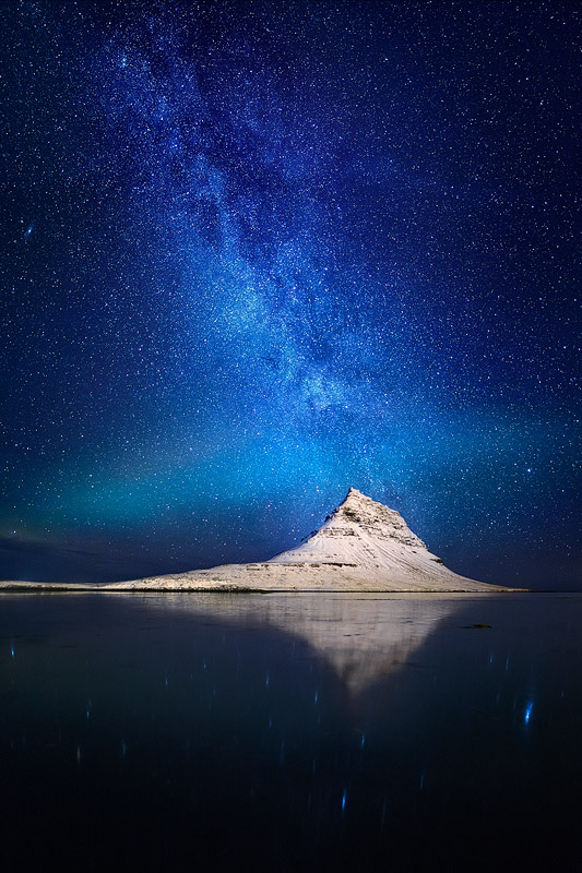 'Lost in Space', Kirkjufell, Iceland, February 2013. This image of an ultra-photographed mountain under the Milky Way and a hint of Aurora, seems to be much more special than most.