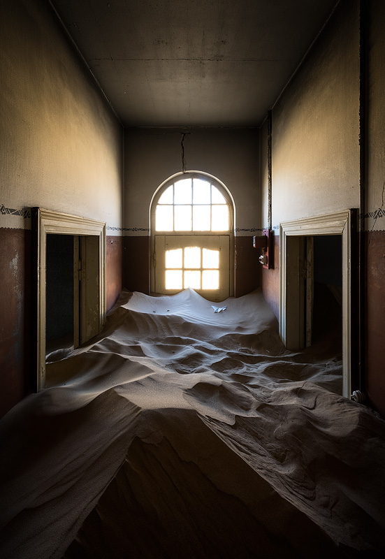 The desert drowns the town with sand, sometimes well over half the doors' height! The desert drowns the town with sand, sometimes well over half the doors' height!